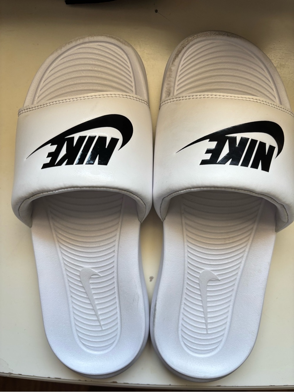 Nike White Slide Sandals with Black Swoosh